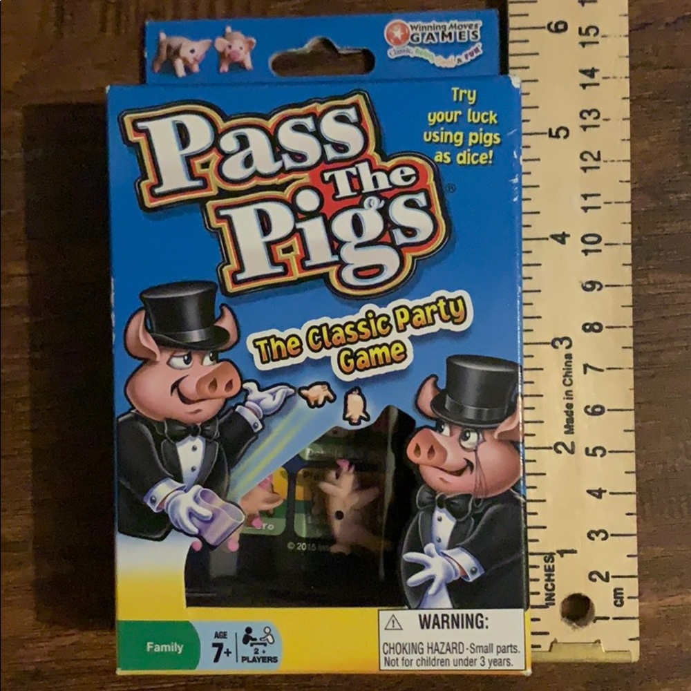 SOLD.  DO NOT BUY.   Pass the Pigs party game ages 7+